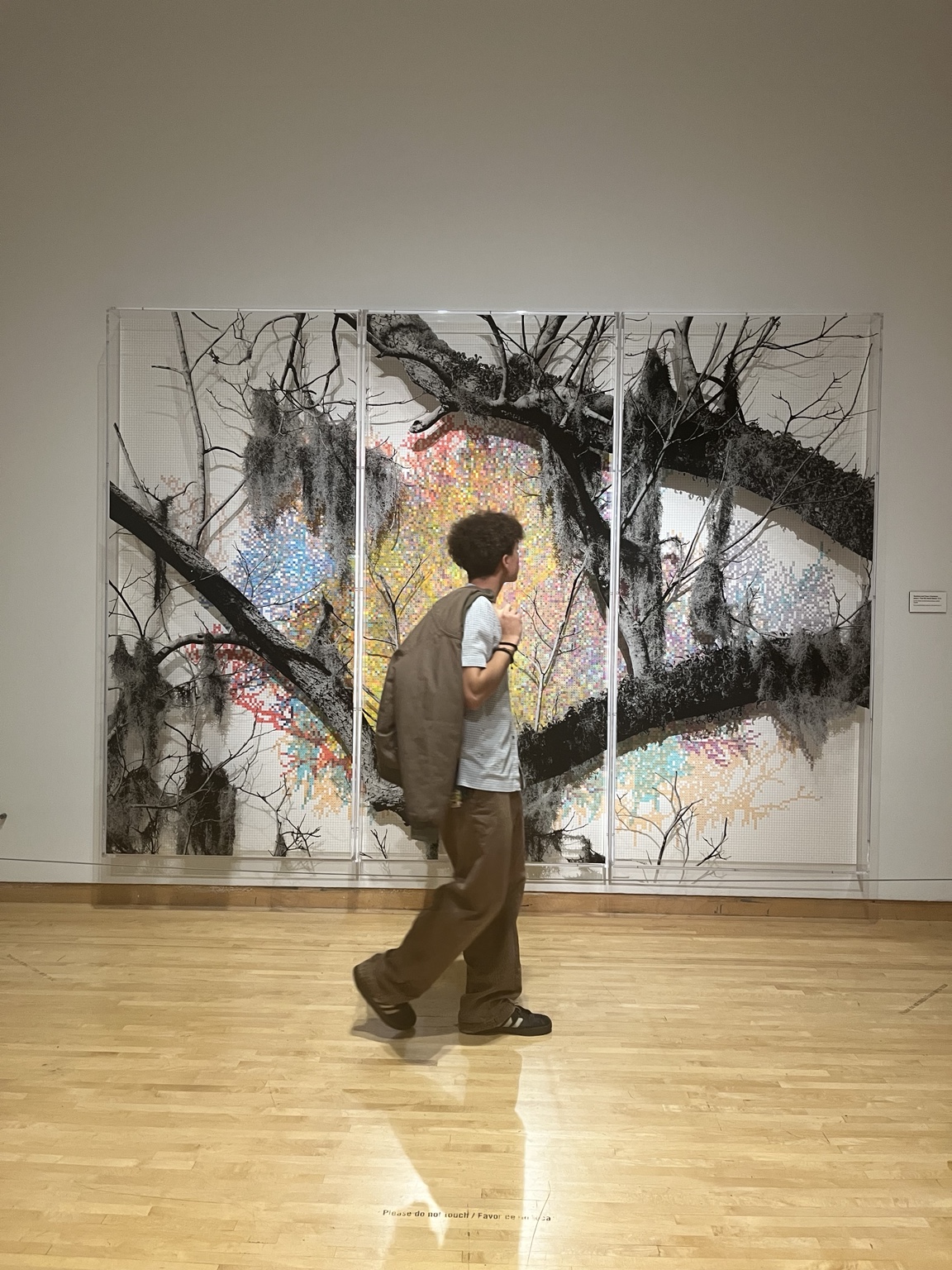 Kendrick in an art gallery